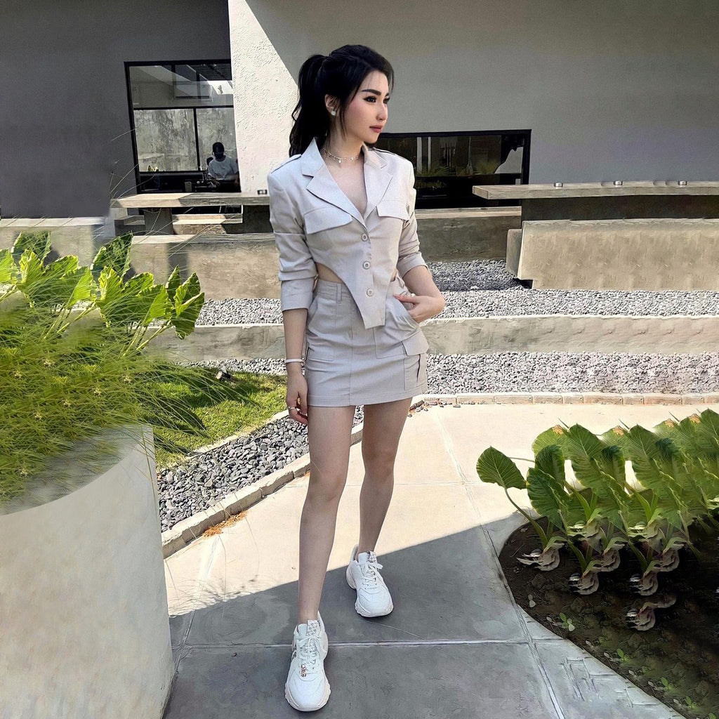 Wear a beige Wayne blazer with a mini skirt in a similar tone, complete the look with white sneakers. To give a little sweet spark wear minimal yet shiny and sparkling accessories.