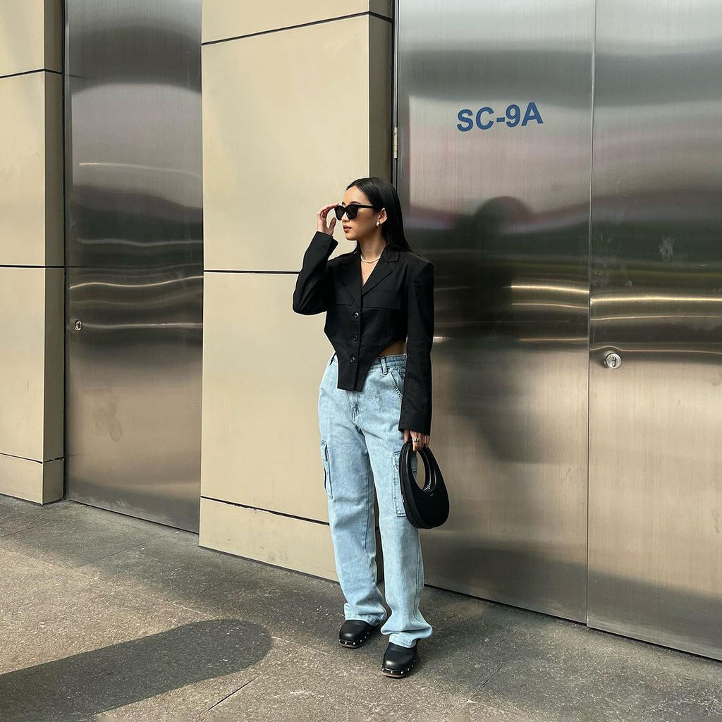 Pair black Wayne Blazer with your fave wide light blue jeans, with black platform and black leather handbag. To give an alluring touch, wear you sunnies and pearl necklace.